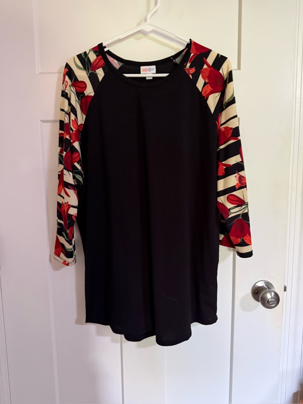 LuLaRoe Black Tunic with Red Floral Raglan Sleeves